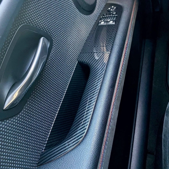 BMW E92 sofőr (bal) oldali ajtóbehúzó+konzol carbon